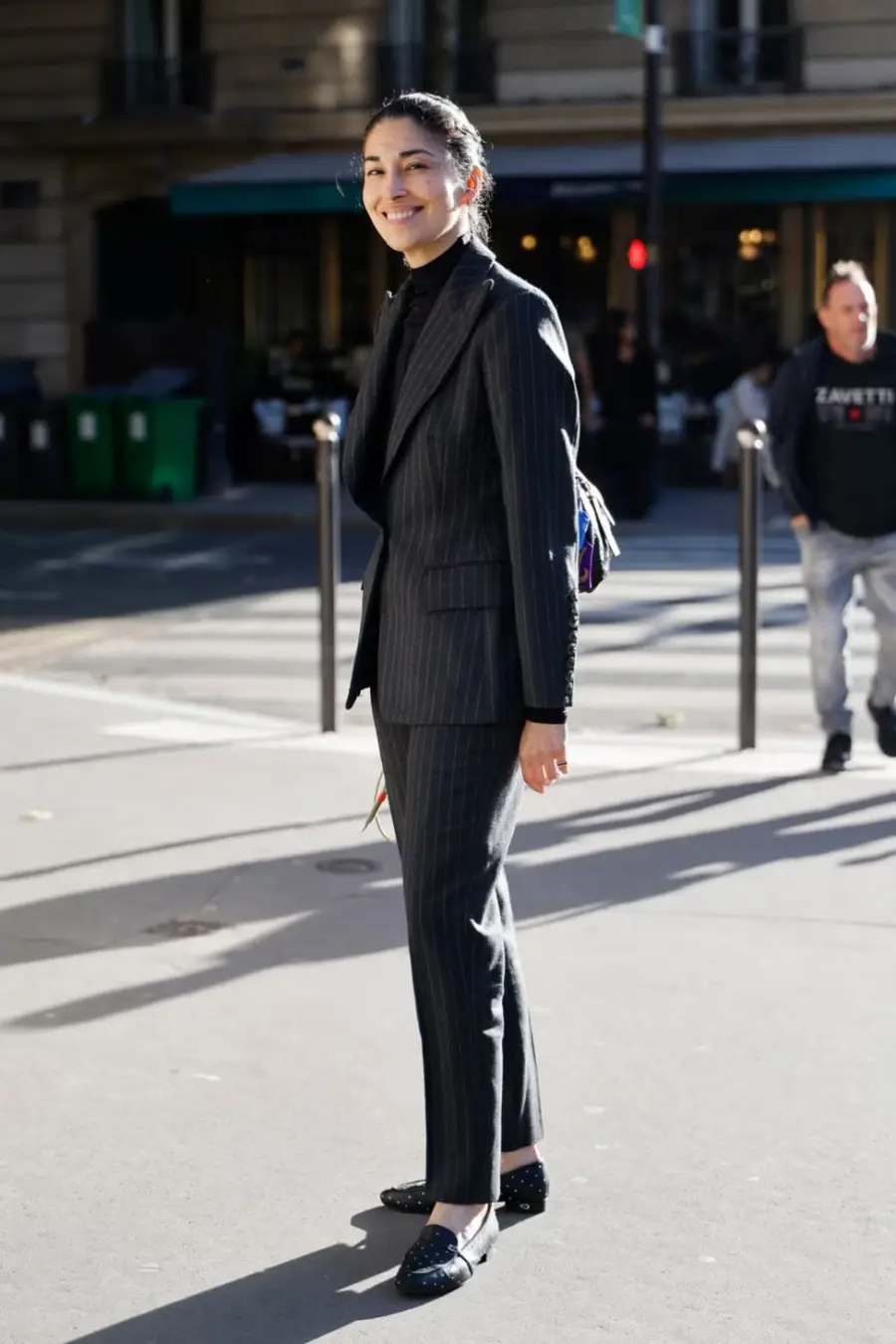 caroline-issa-wears-black-turtleneck-top-grey-striped-suit-news-photo-1760285433