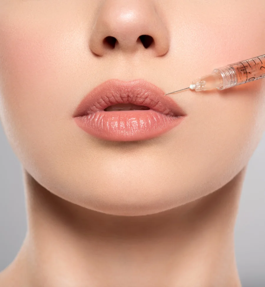 Envato. - Woman getting cosmetic injection of botox in lips, closeup. Woman in beauty salon, plastic surgery clinic. Cosmetology procedures concept. Beauty trea